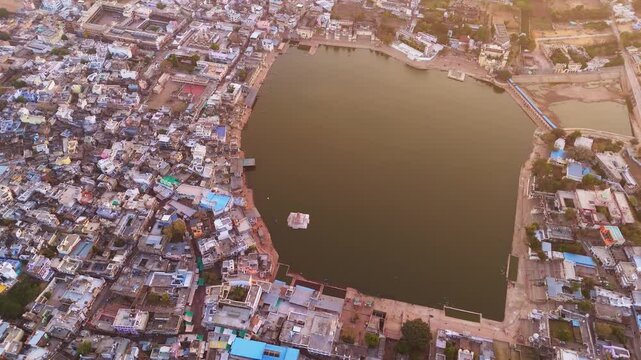 drone shot of pushkar lake and the sacred ghats