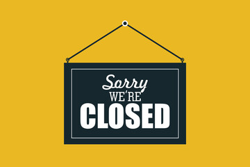 Text on black sign " sorry we are closed sign " isolated on yellow background