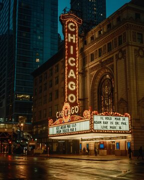 The Chicago Theatre vintage neon sign on a rainy night, Chicago, Illinois