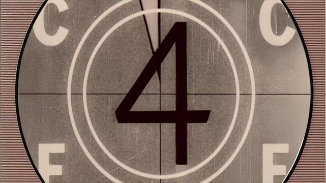 Vintage film countdown leader with number 8-2, aged textures, defocused film look, flicker, grain and scratches effect, classic reel markings for retro video overlays, 4K