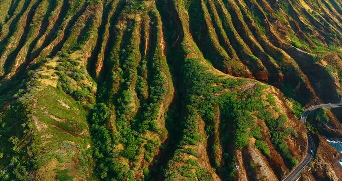 Footage up along the picturesque slopes of the green rocks. Stunning scenery of the mountain at the Oahu Island, Hawaii, USA.