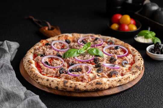 pizza with tomatoes and olives