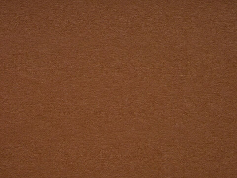 Earthy terracotta meets gentle russet in a textured dance, crafting a canvas of understated warmth