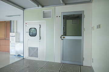 Clean room entry area with airlock doors
