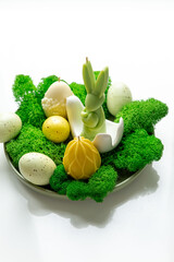 Happy Easter composition on a spring day with green grass with copy space.