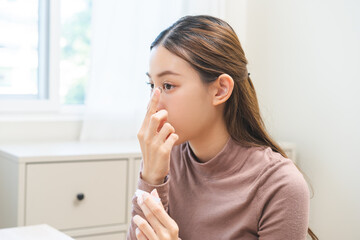 Ophthalmology care, eye sight, vision concept, asian young woman, girl hand holding eye lens and...
