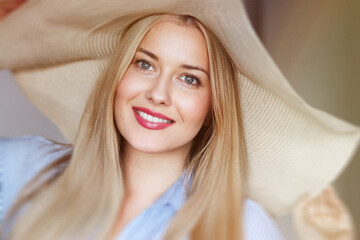 Woman, fashion and summer country charm, blonde beauty and elegance in wide brimmed beach hat....