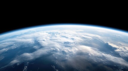 This high-resolution image shows Earth from space. A vast expanse of clouds covers much of the planets surface. The dark space provides a stark contrast. The image is beautifully composed, showcasin