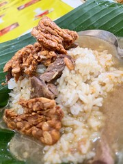 Nasi Gandul is a traditional Indonesian food with rice, meat and tempeh.