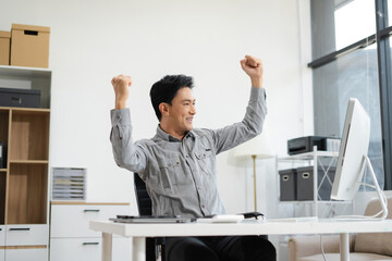 asian businessman are excited business success with inspiration from their excellent financial...
