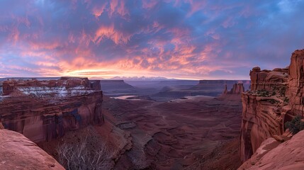 Stunning mesa arch panorama at sunrise over canyonlands national park in utah, usa, with vibrant sky and majestic rock formations