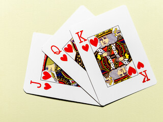 Heart cards from the deck on a green mat