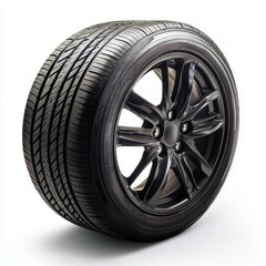 Obraz premium a car tire in an angle, over white background 