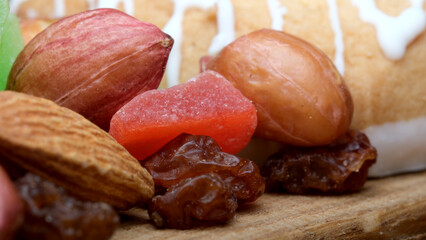 Nuts and sweets on a wooden board