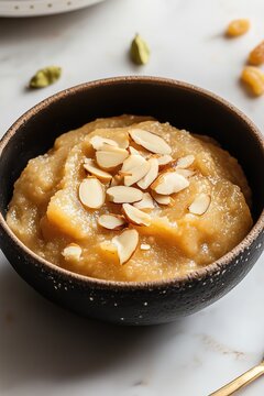  Indian Dessert - Suji Halwa with Ghee, Raisins, and Almonds in Minimalist Elegant Presentation