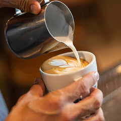  Barista pouring latte art