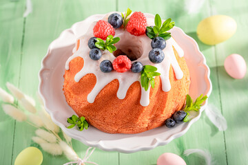 Delicious Easter ring cake with festive spirit decor.