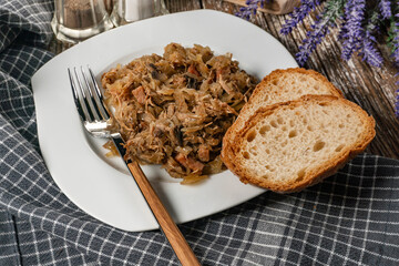 Bigos - sauerkraut stewed with meat, dried mushrooms and sausage.