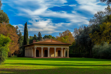 Photo of a countryside landscape with a blue sky and white clouds, a green grass field in the foreground, and an ancient Roman pavilion in the background