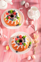 Glazed ring cake for Easter with festive spirit decor.