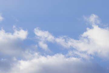 white grey fluff in the sky, white haze accumulation with blue background, many puffy clouds with blue background, blue sky with small fleecy clouds, blue sky with big clouds