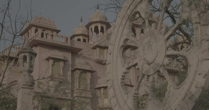 Jaipur, Rajasthan, India. Ungraded C LOG 2, Eternal Wheel Of Samsara And Patrika Gate At Jawahar Circle On Background. Old Pink City. Travel To India. Traditional Rajasthani Style Of Architecture