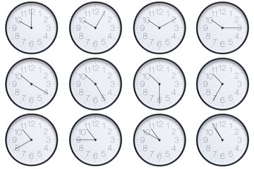 A set of twelve round wall clocks with dark brown frames and white faces showing 5-minute time...