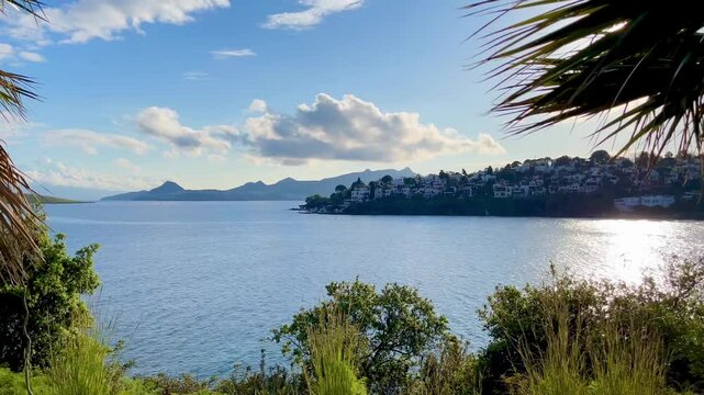 Blue sea, islands and boats on the Aegean coast. Summer vacation and coastal nature concept