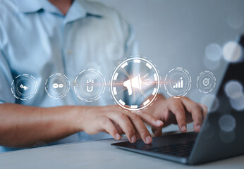 Businessman using laptop with public relations on virtual screen for marketing strategy, public...