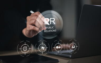 Businessman using laptop with public relations on virtual screen for marketing strategy, public...