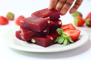 Strawberry halwa, a smooth Indian dessert with a rich pink hue
