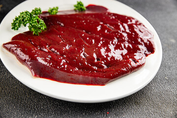 Raw liver beef veal meat steak liver grill appetizer dish fresh gourmet food background on the table rustic food top view copy space keto and paleo diet