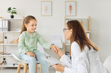 Caring pediatrician kind doctor meets child, examination, female medical practitioner consulting...