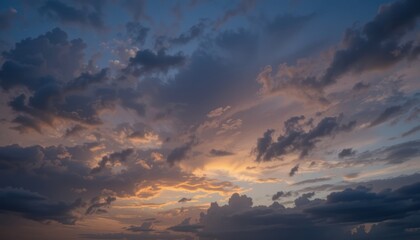 Obraz premium Serene Sunset Sky Deep Blue and Golden Hues, Soft Cloudscape