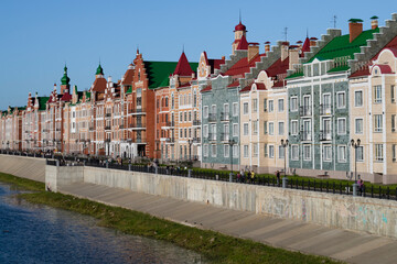 Naklejka premium A fragment of the Brugge embankment on a sunny August evening, Yoshkar-Ola