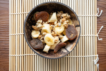 Banana Fruit Muesli and Granola in Coconut Bowl