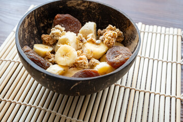 Banana Fruit Muesli and Granola in Coconut Bowl