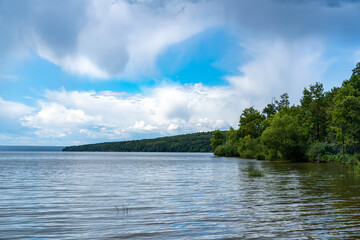 Fototapeta premium Different landscapes on the lake in summer.