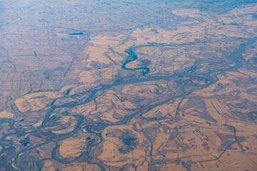 Aerial photography of the magnificent picture of the earth and rivers by plane