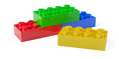 Obraz premium Three red, green and blue colored plastic toy bricks or blocks stacked together with one yellow in front on white background