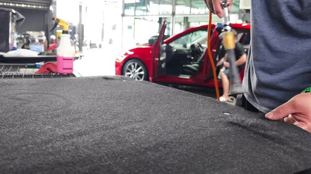 The professional car carpet cleaning process in action ensuring a spotless and fresh appearance