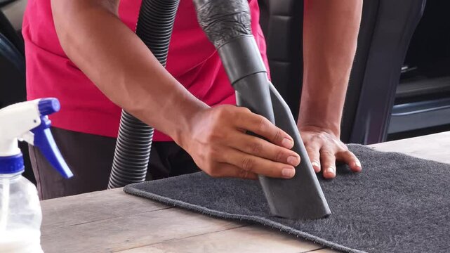The professional car carpet cleaning process in action ensuring a spotless and fresh appearance