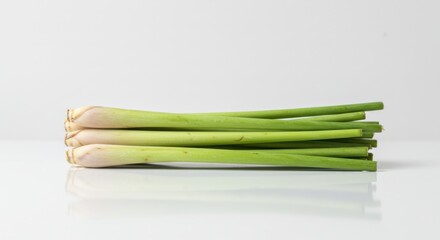 Fresh Lemongrass Stalks Ready for Cooking on a White Background