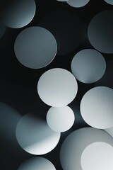 Abstract circular shapes with soft light reflection on black background
