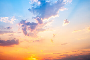 Sky,sunset, beautiful , luxury soft gradient orange gold clouds and sunlight on the blue sky perfect for the background, Sunrise on morning or evening in winter warm time ,Twilight summer,silhouette