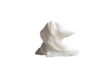 A minimalist composition featuring a white cloth hat in a side view on a clean white background, emphasizing the fabric's texture and natural folds.