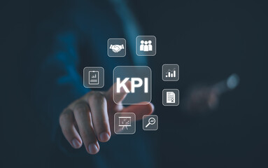 Fototapeta premium Analyzing Key Performance Indicators, Businessman using virtual screen to analyze key performance indicators KPI with various graphs and charts, showcasing data analysis and performance tracking