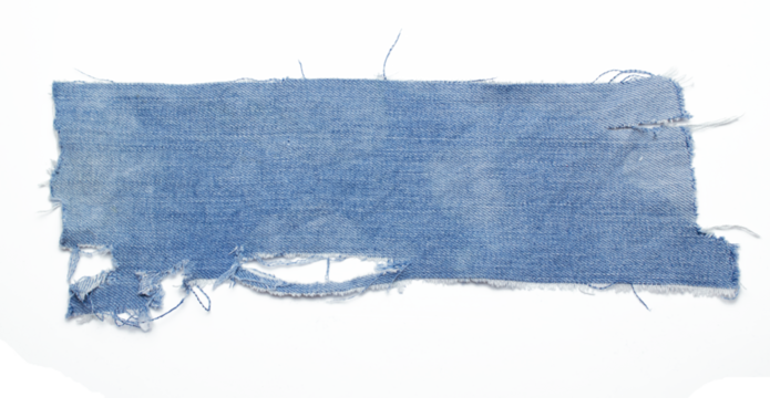 jeans. a frayed and torn piece of denim rag.