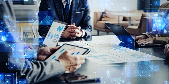 Group of business people meeting and digital technology concept