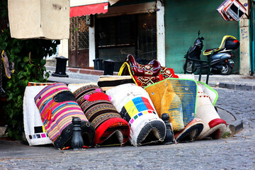 Local colorful saddles sold on the streets of the coppersmiths' bazaar in Gaziantep